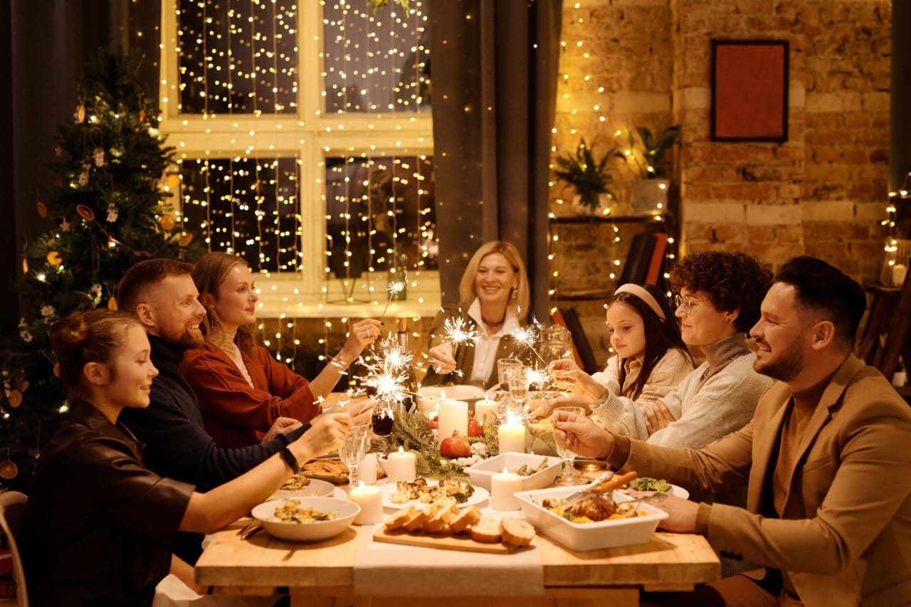 Family celebrating the holidays at dinner.