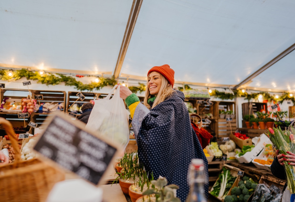 Woman picking up holiday groceries.