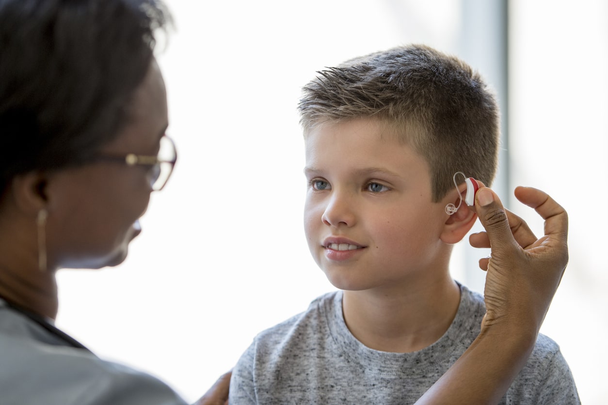 Young boy with hearing loss