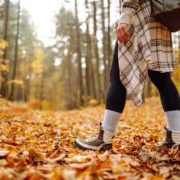 Woman takes hike in autumn