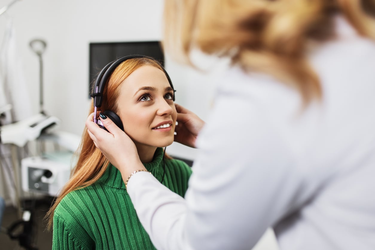 Woman gets a hearing test